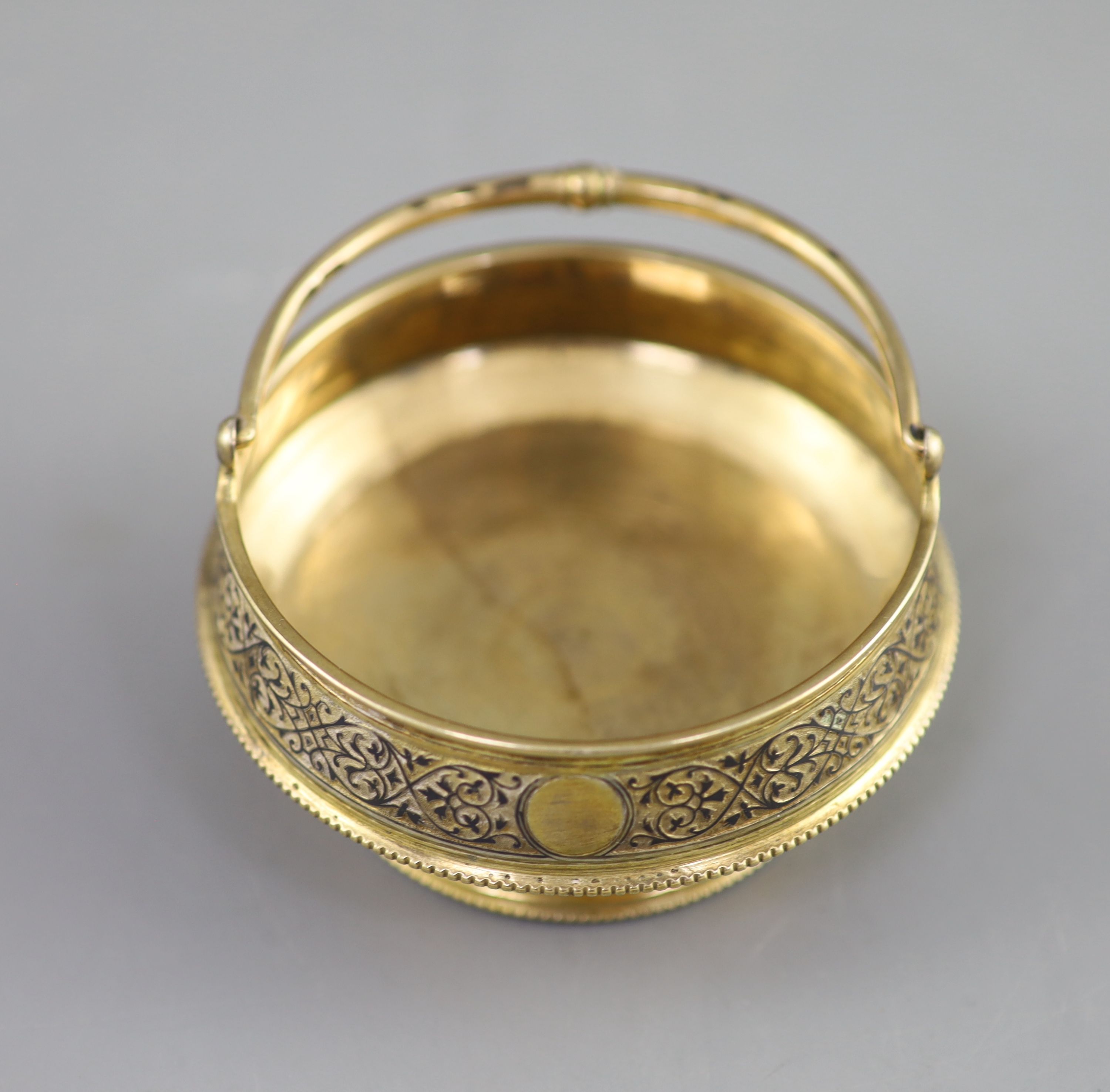 A late 19th century Russian 84 zolotnik silver gilt and niello bonbon basket